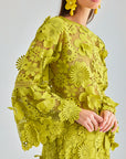 Maxi-length green lace skirt with tiered layers