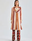 Statement-making pearl jacket with dynamic fringe texture