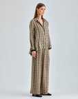 Stylish beige wide-leg pants with sleek finish and front pocket for added functionality