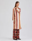 Evie Jacket Pearl offering both style and comfort with playful fringe details