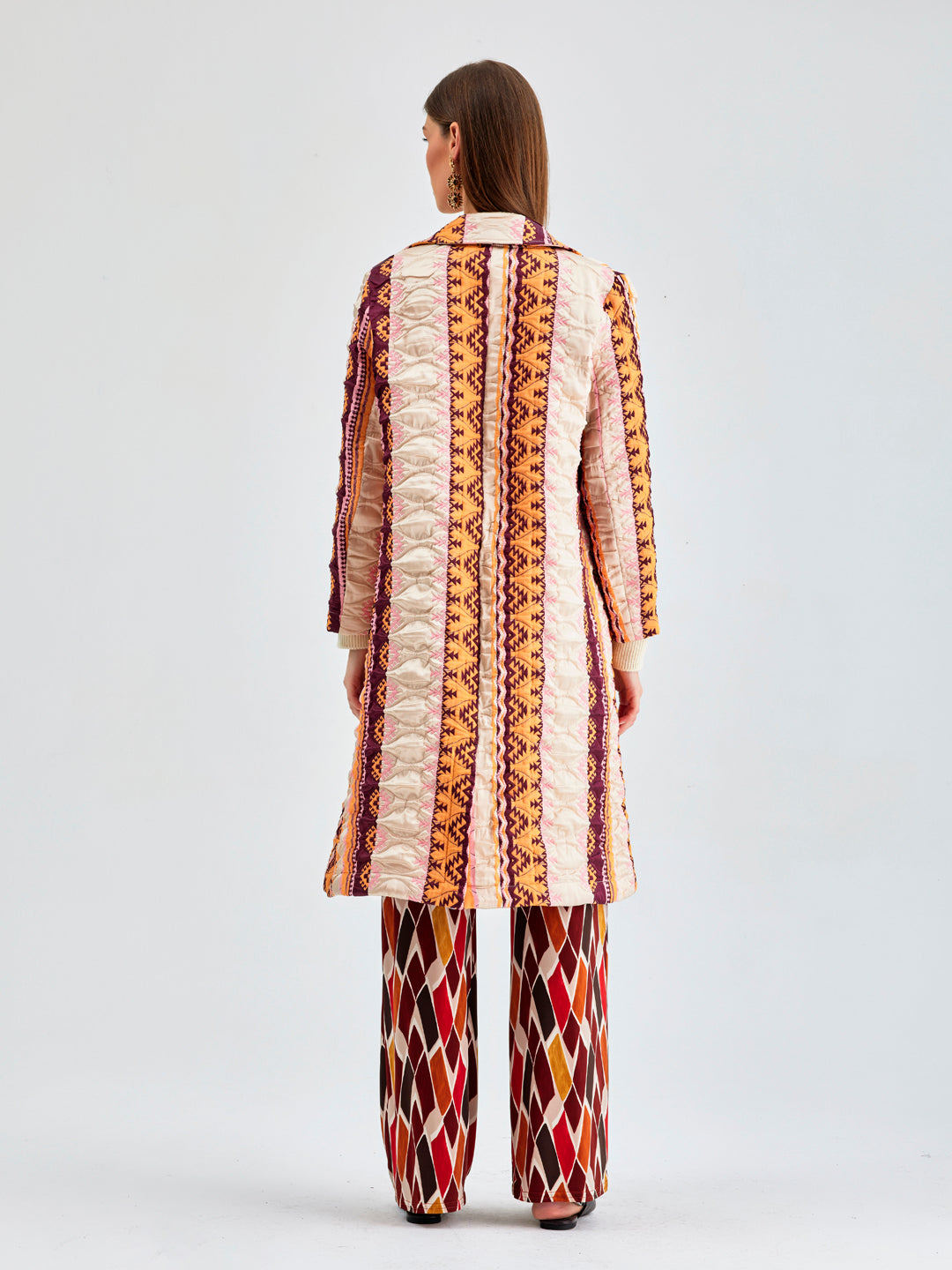 Unique pearl jacket with fringed details for a fashionable and energetic look