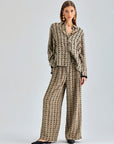 Chic beige trousers with glossy finish and wide-leg cut, perfect for formal and casual wear