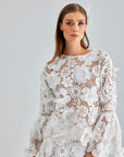 Maxi-length white lace skirt with tiered scalloped layers