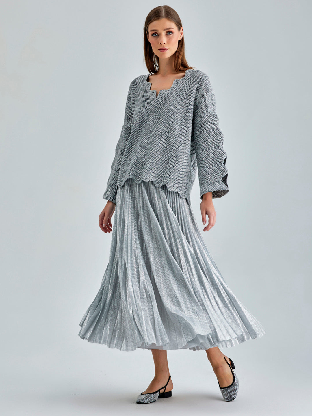 Elegant Aria Skirt Silver with a captivating metallic shine and flowing silhouette