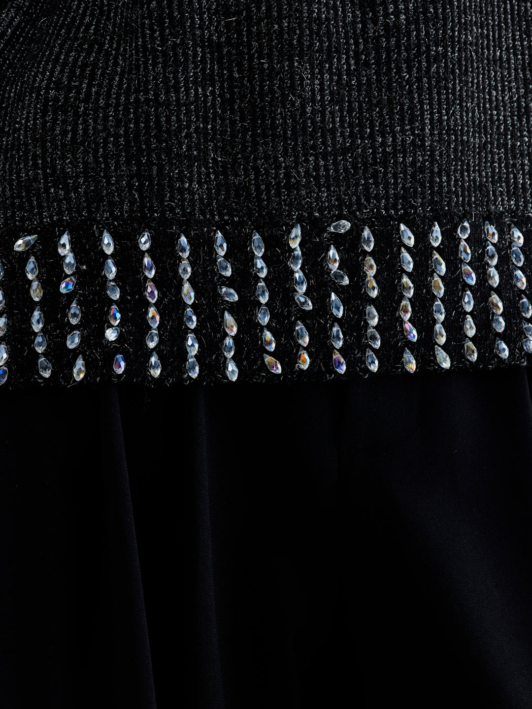 Contemporary Avella Sweater featuring a subtly metallic finish and chic beaded details for a touch of sophistication