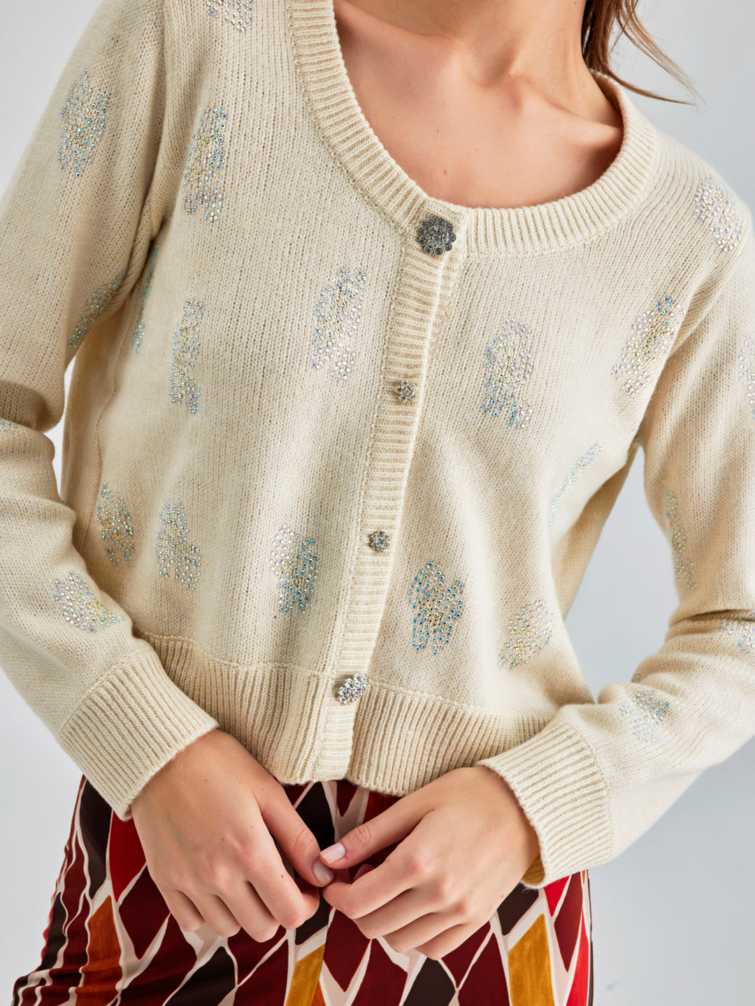 Daisy Cardigan Ivory featuring delicate embroidery and a serene ivory shade for a soft, sophisticated look