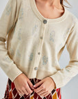 Daisy Cardigan Ivory featuring delicate embroidery and a serene ivory shade for a soft, sophisticated look