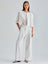 Elegant ivory trousers featuring a high waist and flowing wide-leg design