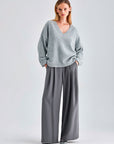 Sophisticated grey wide-leg trousers with belt loops and back pocket