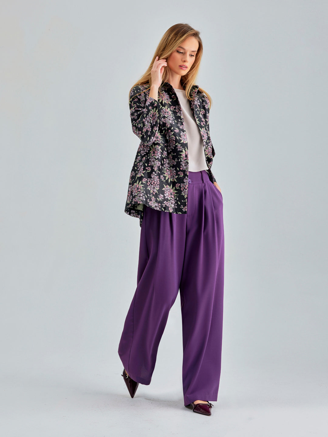 Elegant high-rise violet pants with wide-leg cut for modern sophistication