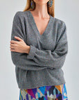 Kate Sweater Anthracite showcasing a rich, deep hue and ribbed detailing for a modern edge