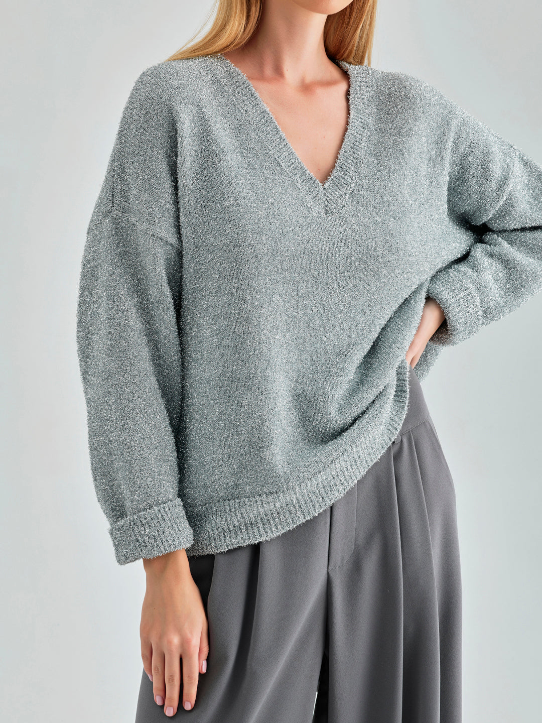 Kate Sweater Grey with a flattering V-neck cut and cozy knit fabric, offering both style and warmth