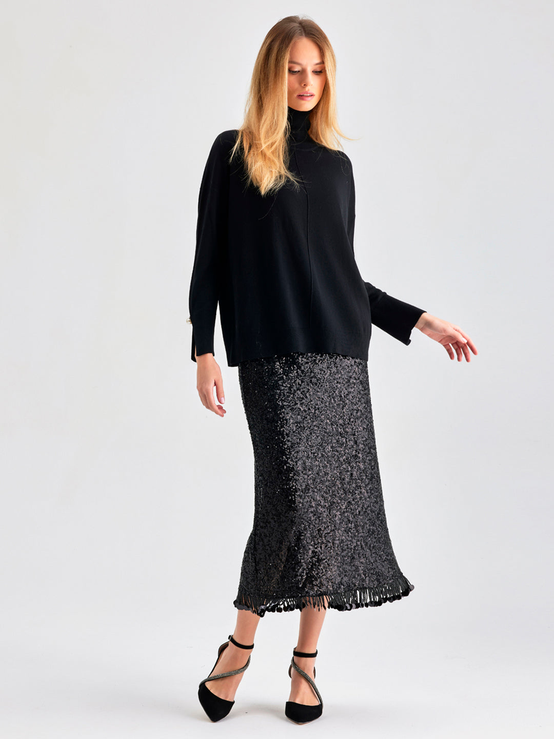 Lupita Skirt Black with fringe detailing and sleek midi-length design