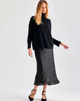 Lupita Skirt Black with fringe detailing and sleek midi-length design