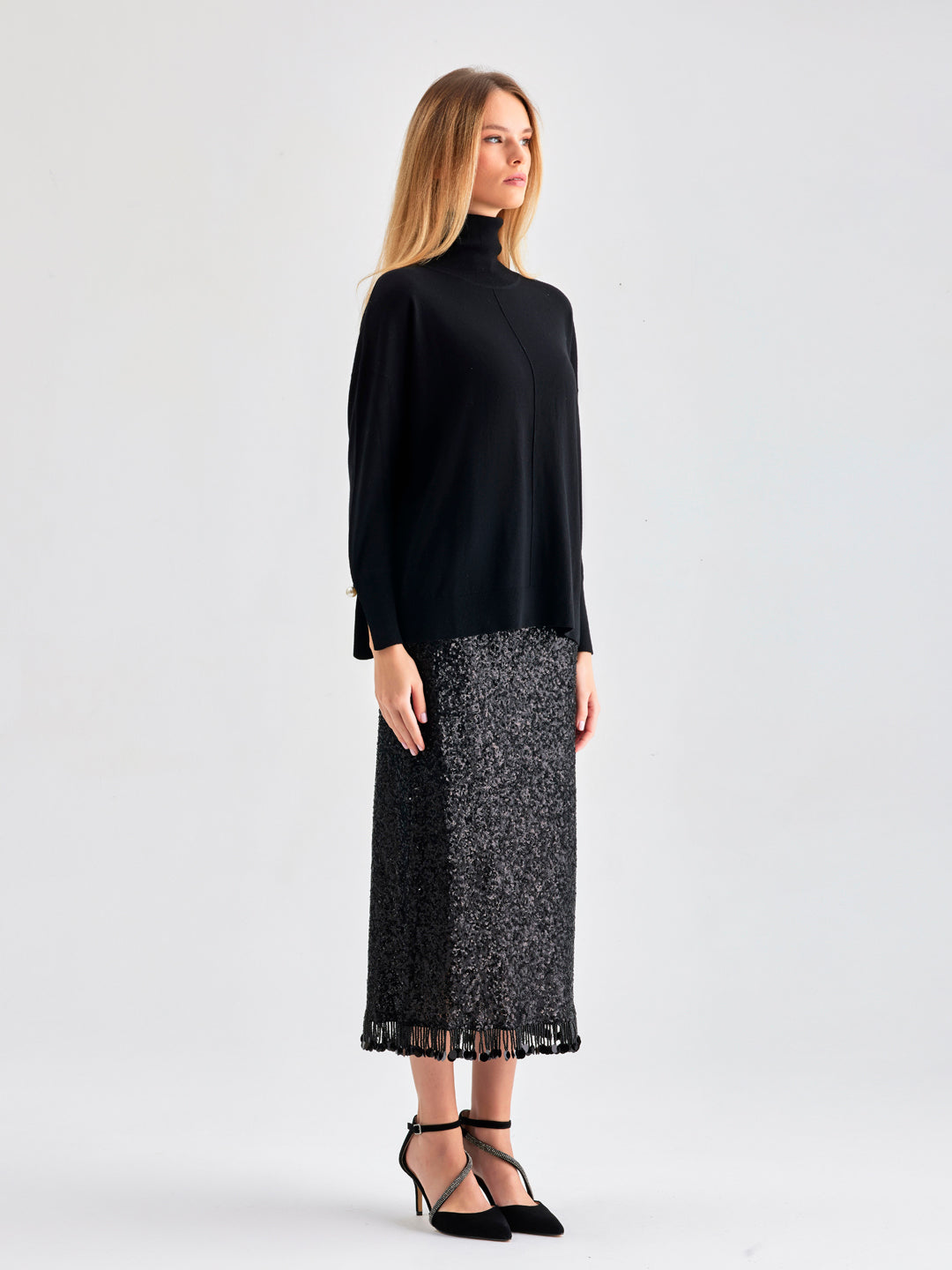 Sophisticated Lana Knit Top Black featuring a soft knit fabric and embellished pearl cuffs for added glamour