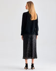 Midi-length Lupita Skirt Black featuring a polished silhouette and fringe accents