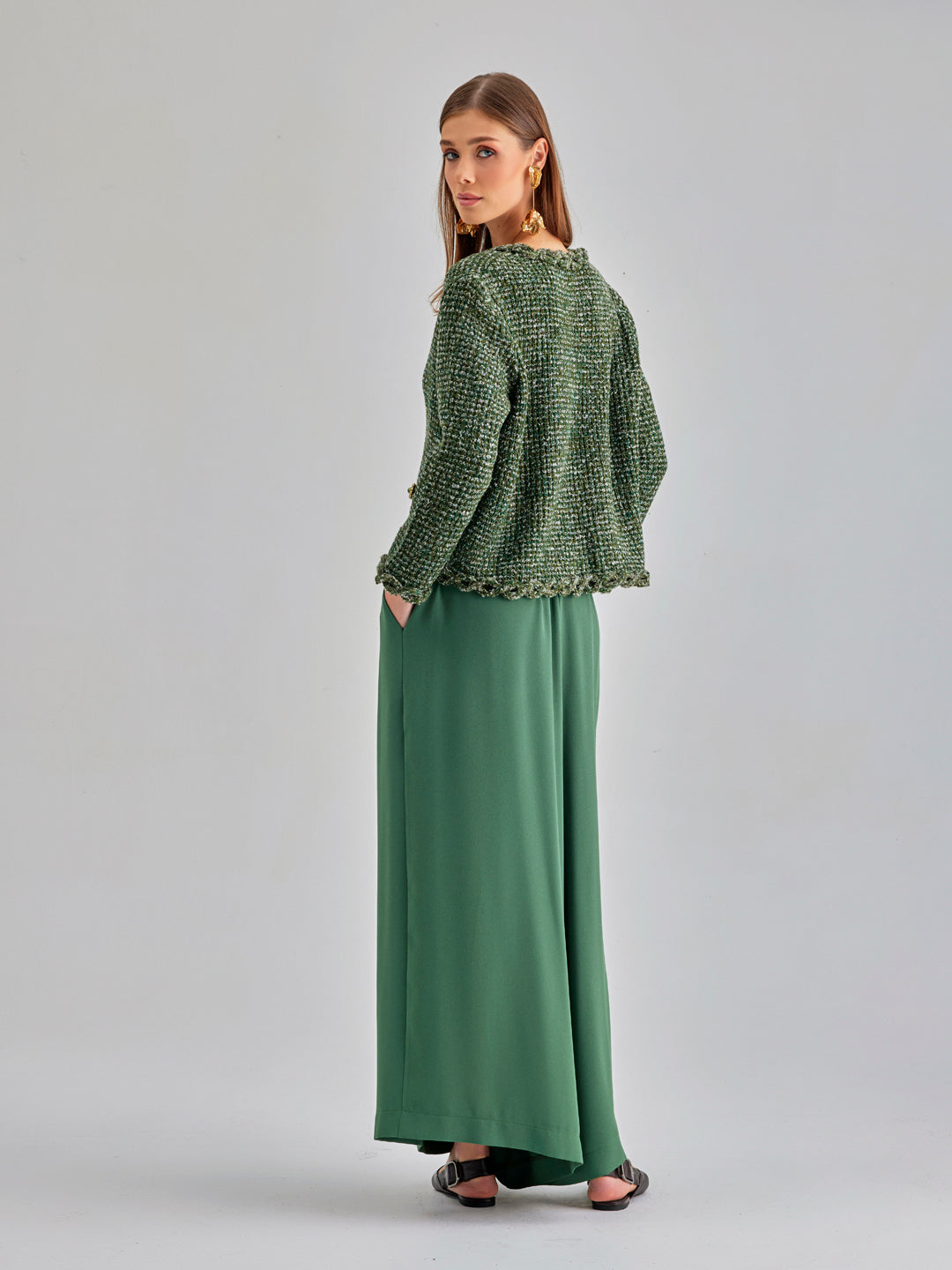 Chic green trousers with wide-leg silhouette and flattering waistband