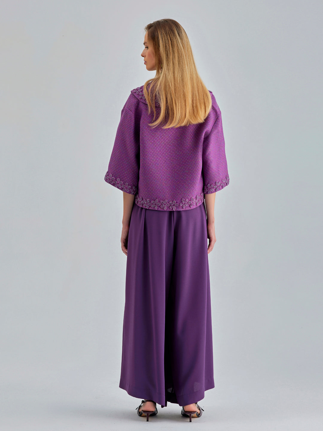 Flowy Gia Pants Violet featuring a high-rise fit and wide-leg cut for standout style