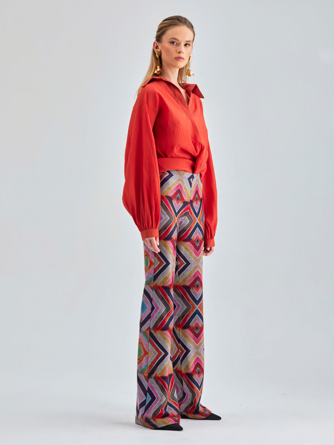 High-rise Siara Pants in vibrant geometric colors, perfect for making a bold fashion statement