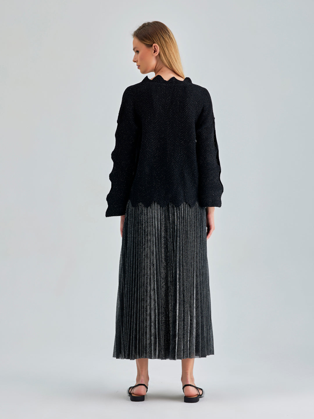 Aria Skirt Silver Black featuring a comfortable elastic waistband and versatile midi length