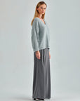 Jenna Pants in grey showcasing a flattering high-rise fit and wide-leg cut