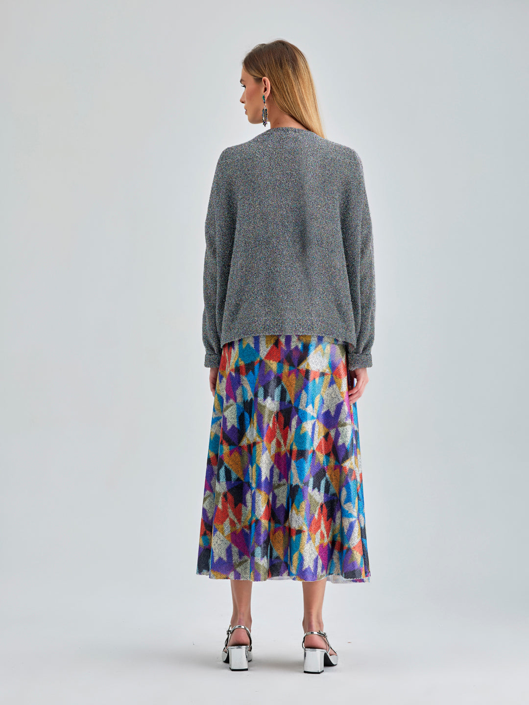 Contemporary Cora Skirt with lively geometric patterns and a subtle sheen, crafted from premium polyester