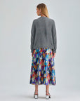 Contemporary Cora Skirt with lively geometric patterns and a subtle sheen, crafted from premium polyester