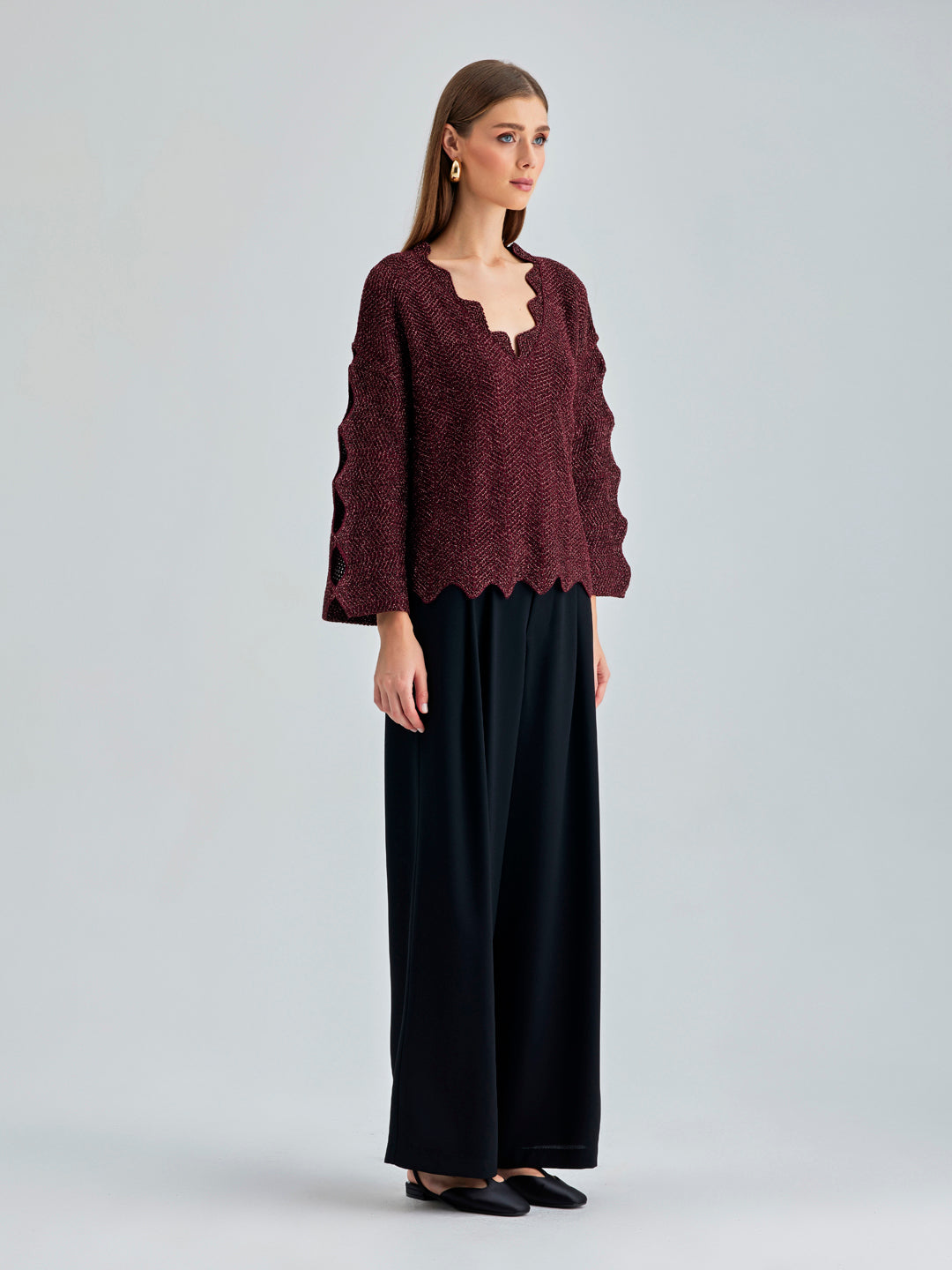 Sophisticated Ernesta Sweater Bordeaux with bold design elements and striking sleeve cut-outs