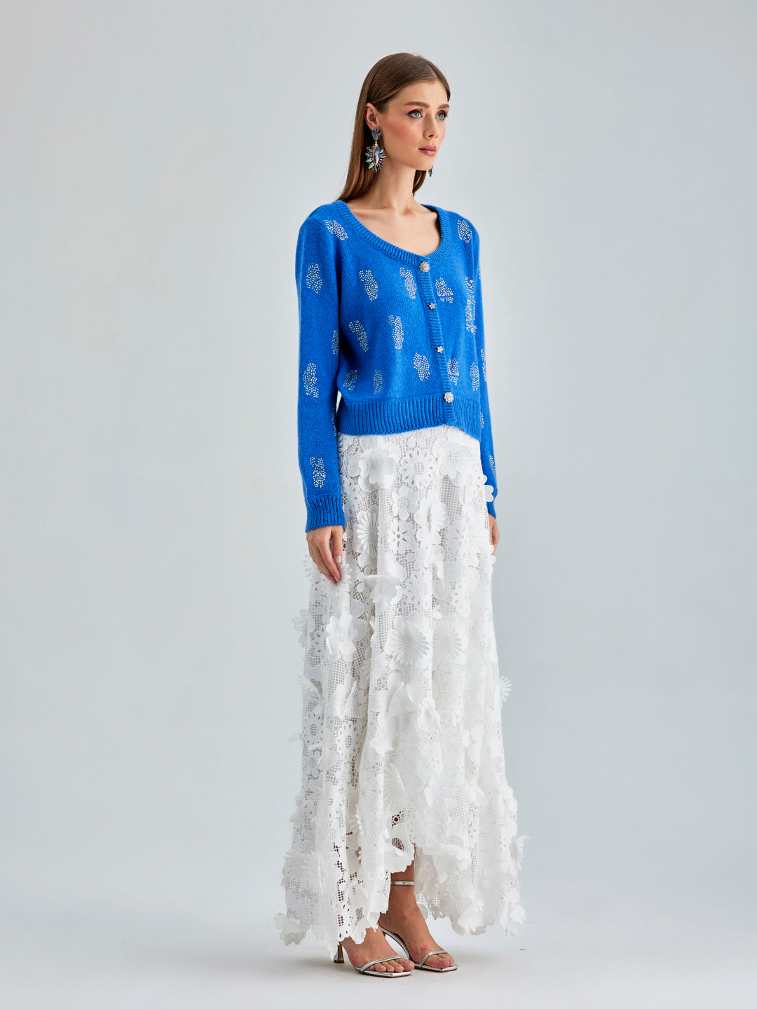 Sophisticated Daisy Cardigan Blue featuring intricate embroidery and a lightweight, elegant design