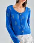 Daisy Cardigan Blue with a serene hue and delicate embroidery, offering a blend of comfort and classic style