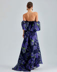 Zelene Gown Violet adorned with luxurious floral patterns and an open back for a sophisticated look