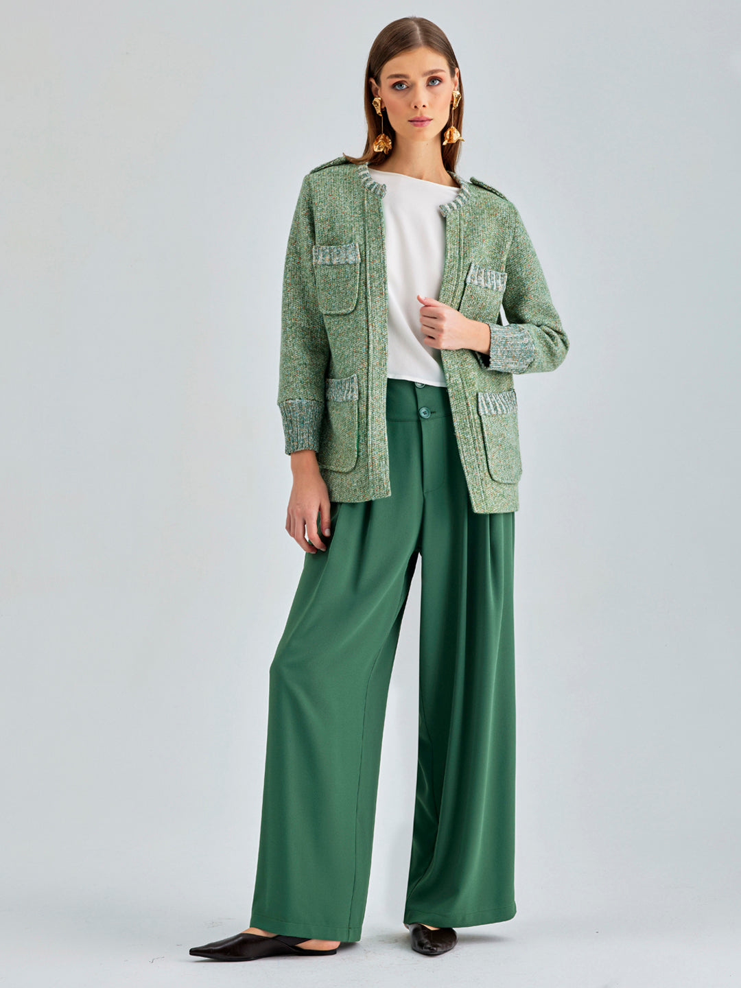 Green Paolina Jacket combining comfort and sophistication for winter outings