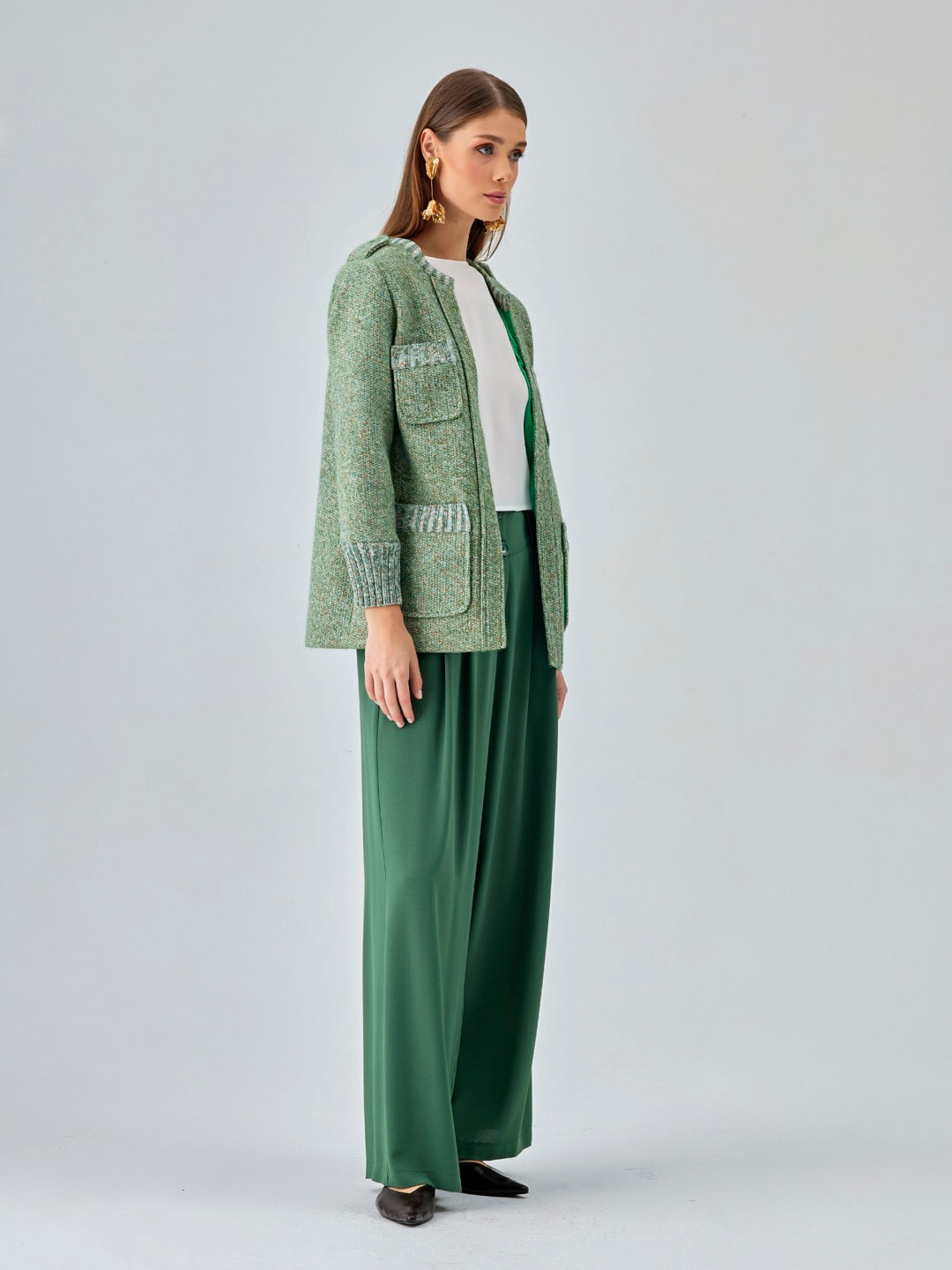 Rich green Paolina Jacket with textured knit for insulation and elegance