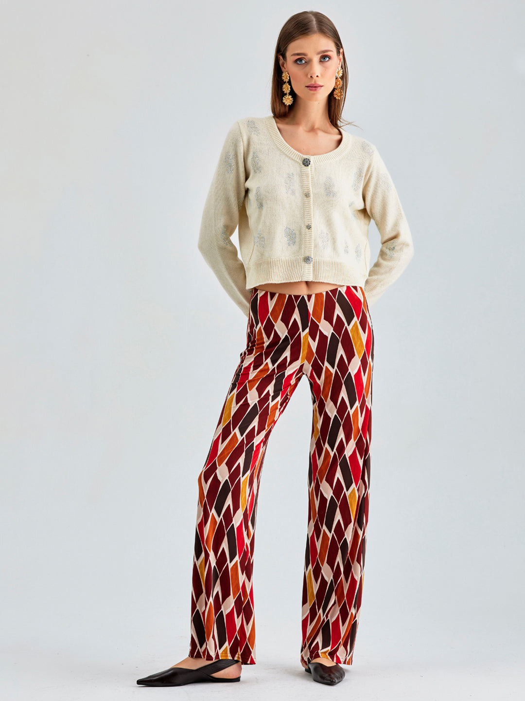 Dynamic Pepe Pants featuring a lively mix of colors and retro-inspired check patterns