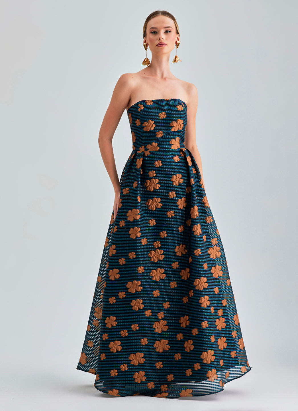 Sierra Gown Strapless featuring vibrant paisley and floral patterns with an off-shoulder design